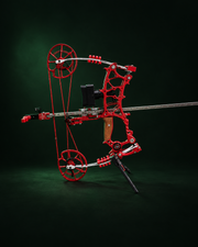 BFL-LM1 red compound bow with scope and training rod in a dark studio